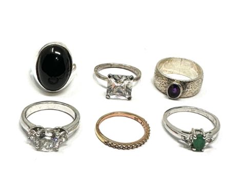 6 silver stone set rings 