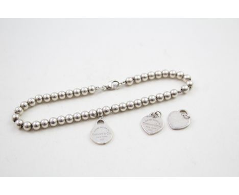 Silver bracelet and pendants/charms by designer Tiffany &amp; Co (7g) 