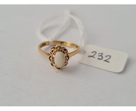 A fancy opal ring in 9ct - size K - 1.7gms