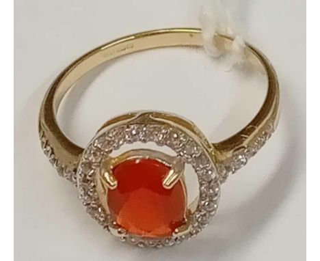 A fire opal &amp; diamond cluster ring in 9ct - size N - 2.2gms