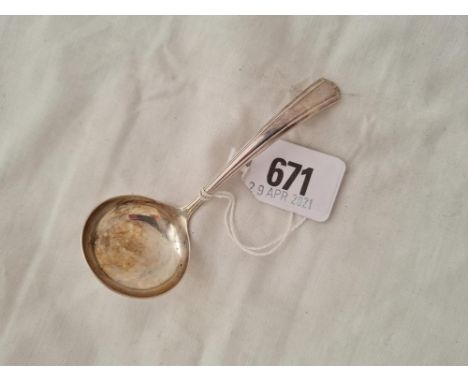 A cream ladle with circular bowl Sheffield 1977 