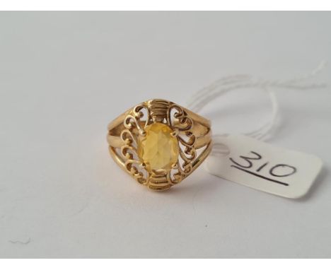 An orange opal stone ring in 9ct - size N - 4gms