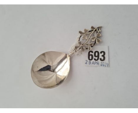 A late Victorian caddy spoon with unusual leaf decorated handle Chester 1899 by IF? 