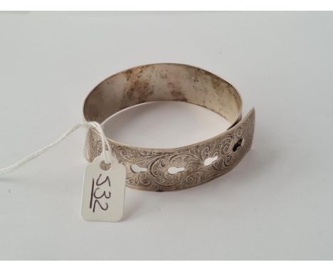 A silver buckle bangle
