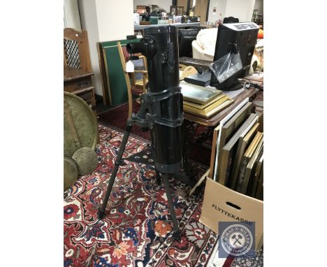 A Jessops Celestron telescope on tripod stand 