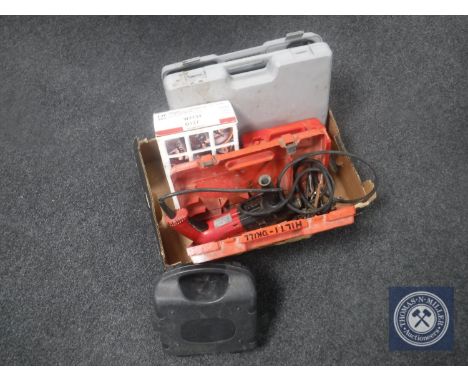 A box of Hilti TE 10 cased drill, Power Master drill, multi tool and a table saw 