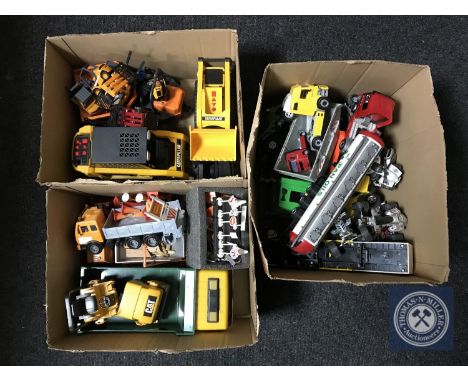 Three boxes of plastic vehicles including fork lift truck, tanker, quad bike etc 