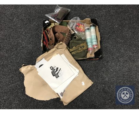 A box of military clothing, ammunition belt, brass button polisher, hand flares, wallet of targets etc 