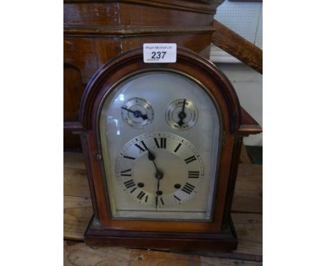 An early 20th Century mahogany cased bracket/mantel clock, silvered face, with chimed silent feature.