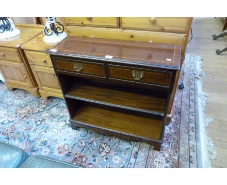 A reproduction mahogany bookcase, having two single frieze drawers above one adjustable shelf.   CONDITION REPORT:  Width 30 