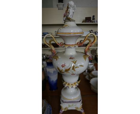 A large modern Continental ceramic double handled vase on plinth base  