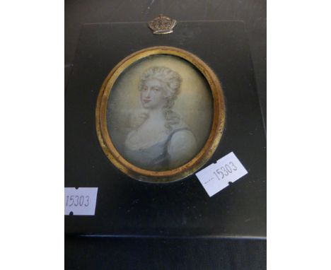 A small framed miniature picture, head and shoulders portrait of a young lady.