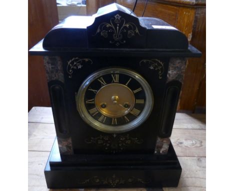 A Victorian and black slate and marble mantel clock in architectural case.