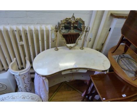 A small marble topped dressing table with metal frame and glass shelf.