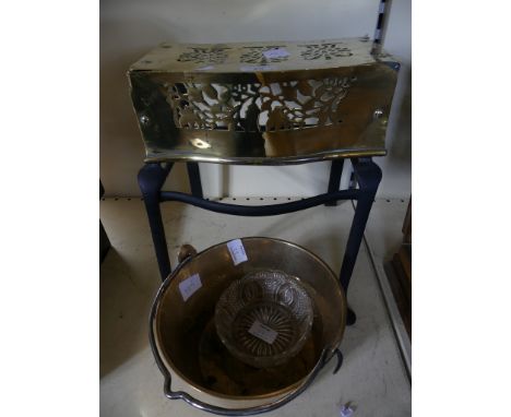 A vintage brass and iron footman together with a small brass preserve pan 