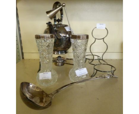 A mixed lot comprising a silver-plated spirit kettle and stand, silver-plated spoon ladle, a pair of cut glass vases with sil