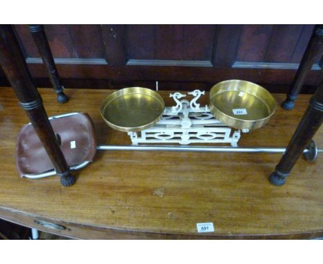 A mixed lot comprising a pair of iron and brass pan scales and a folding shooting stick.