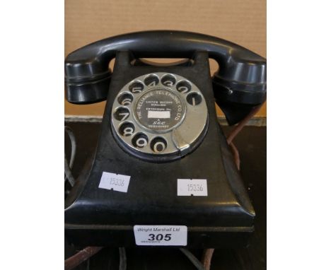 A Vintage GEC black bakelite telephone.