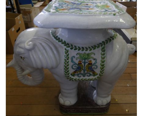 A modern ceramic seat formed as an elephant