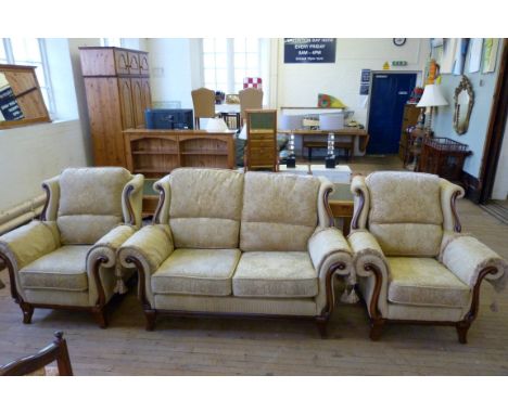 A modern floral upholstered three piece seat with Sherwood frame comprising two seater sofa and pair of armchairs 