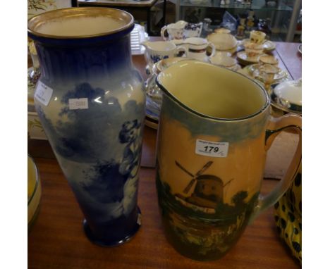 A large Royal Doulton wash jug decorated with a windmill scene pattern no. 3394, together with a further Doulton vase decorat