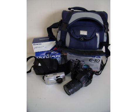 Selection of various cameras and camera equipment with cases including Olympus E10, various other Olympus camera bodies etc. 