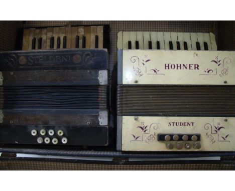 Vintage travelling trunk with two accordions including a Hohner Student and a German Steldeni accordion 