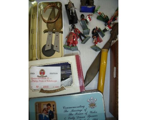 Selection of various alloy Britain's Beefeaters, guardsman, soldiers etc, a cased Dunlop pressure gauge, cardboard box, tins 