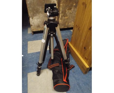 A Velbon Camera Tripod with Bag.