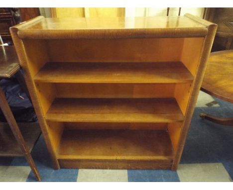 An Oak Three Shelf Open Bookcase.