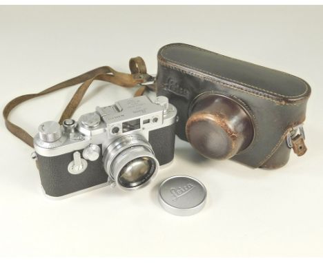 LEICA IIIg. A Leica IIIg No. 825217 with Summaron f.2 50mm lens No. 1253855. With lens cap, case &amp; instruction book with 