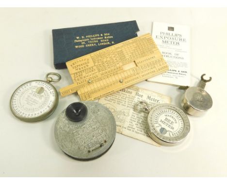 EXPOSURE METERS ETC. Four meters: A Phillips wooden slide meter in case; a Watkin's Bee Meter; a Wynne's Infallible Exposure 