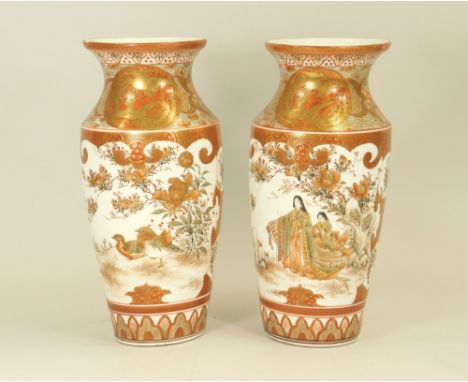 JAPANESE PORCELAIN. Two Japanese porcelain vases, each with two reserves, one painted with figures in a rocky landscape, the 