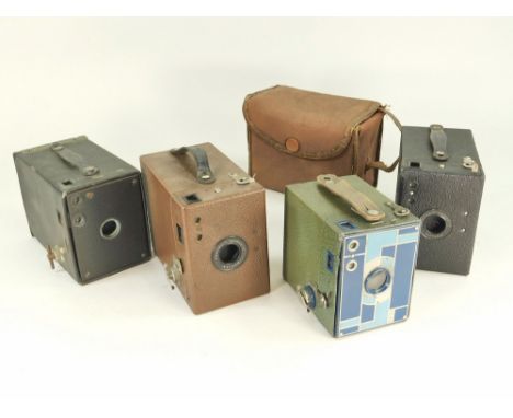 KODAK. Four Kodak box cameras: a Beau Brownie in blue & green; a brown & a black Portrait Hawkeye Star & a No2. Brownie.All c
