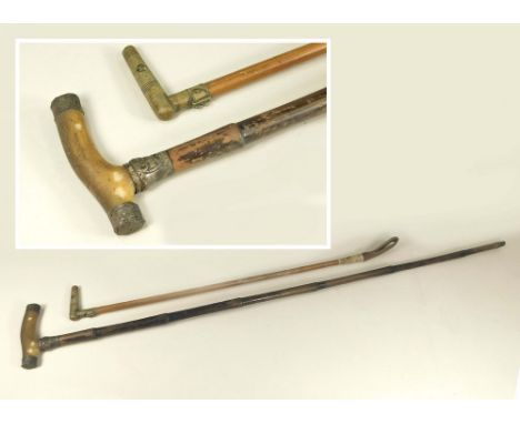 WALKING STICK ETC. A silver mounted, horn handled walking stick & a riding crop with whistle handle, the metal strap stamped 