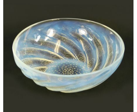 LALIQUE. A Lalique, opalescent 'Poissons' bowl. Moulded signature R. LALIQUE. Diameter 23.5cm.