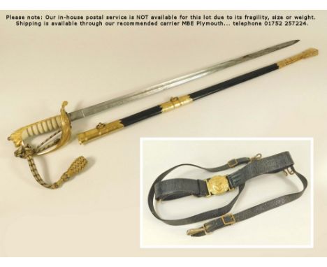 NAVAL DRESS SWORD. An Elizabeth II Royal Navy officers dress sword with scabbard, belt & cover belonging to the late Lieutena