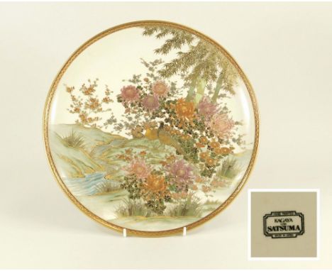 KOBE SATSUMA. A Japanese Satsuma wall plate decorated with pheasants in a landscape. To the reverse a black printed stamp 'Ka