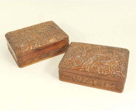 CARVED BOXES. Two South East Asian carved hardwood playing card boxes.