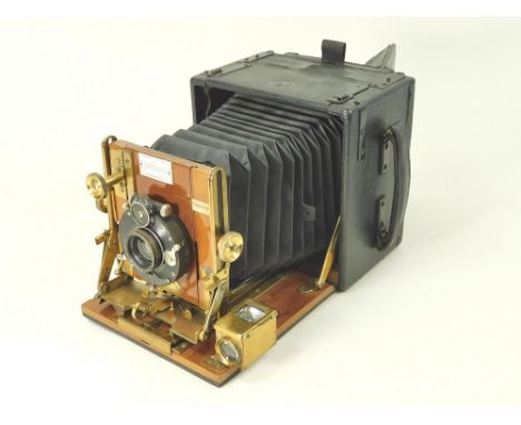 SANDERSON CAMERA. A 'Sanderson Regular' hand & stand plate camera with leather covered mahogany body & brass parts. 9in. Zeis