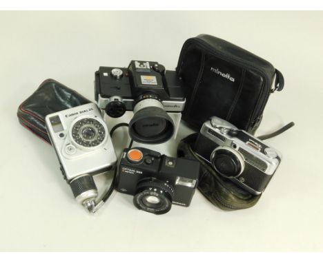 VARIOUS. Four 20th century compact cameras: a Canon Demi; an Agfa Optima 335; a Canon Dial 35 & a Minolta 110 Zoom SLR.All ca