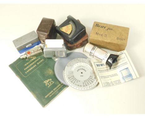EXPOSURE METERS ETC. Four meters: a Kodalux L with case; a Bakelite Dorn Prix with case; a  Bewi Junior  Model II with box & 