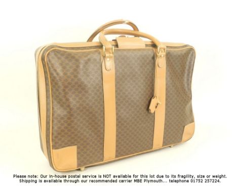 CELINE SUITCASE. A leather mounted 'Celine' suitcase. 40 x 58 x 15.5cm.