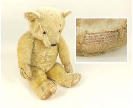 TEDDY BEAR. A large Chad Valley mohair teddy bear with swivel limbs & long stitched claws, the head with glass eyes, pronounc