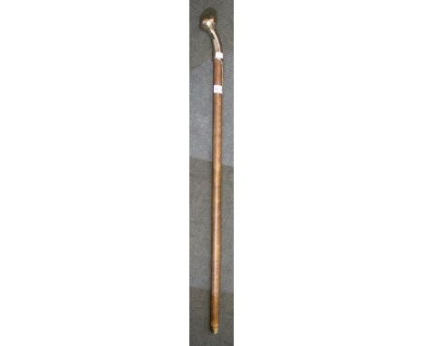 A walking stick with substantial brass knob handle