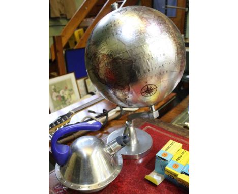 Kettle together with metal globe