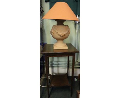 Edwardian mahogany inlaid lamp table 72cm high together with a terracotta lamp and shade  