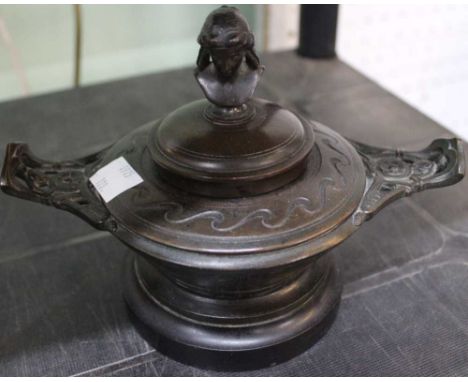 A classical revival design bronzed inkwell.