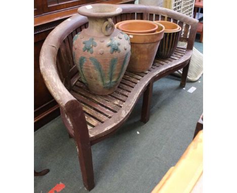 Serpentine fronted teak garden bench