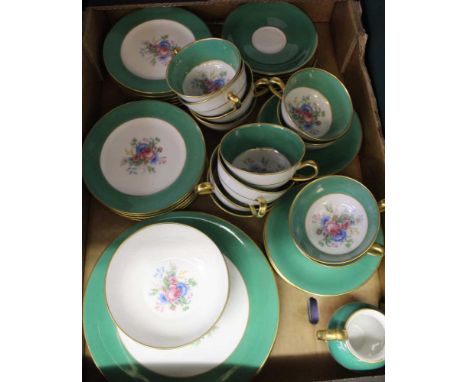 A Limoges part tea set, jade green edge with floral decoration